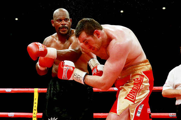 Tony Thompson (left) recorded a TKO victory over David Price on July 6 in Liverpool. (Scott Heavey/Getty Images)